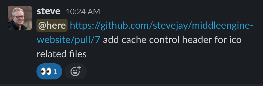 A pull request notification in Slack with the 'looking' reaction